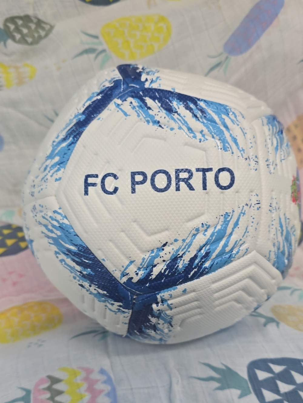 White and Blue Soccer Ball - Official Logo